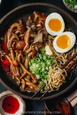 Bowl of noodle soup with mushrooms and eggs